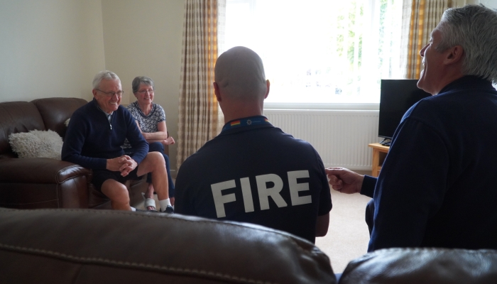 Firefighters talking during a Home Fire Safety Visit