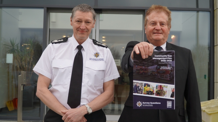 Chief Fire Officer Steve Helps and Chair of the Combined Fire Authority, Cllr John Shuttleworth, with the CRMP booklet. 