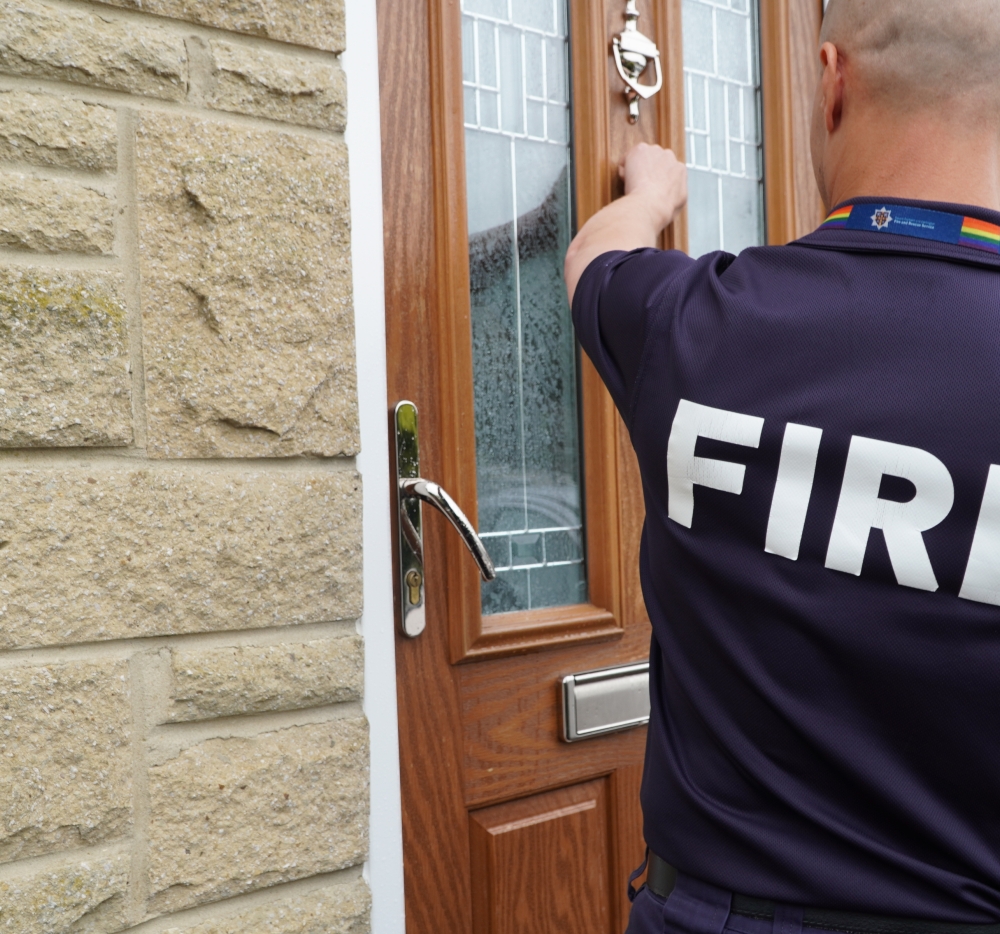 Firefighter knocking on door